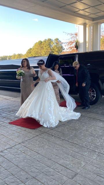 bride walking out of limousine